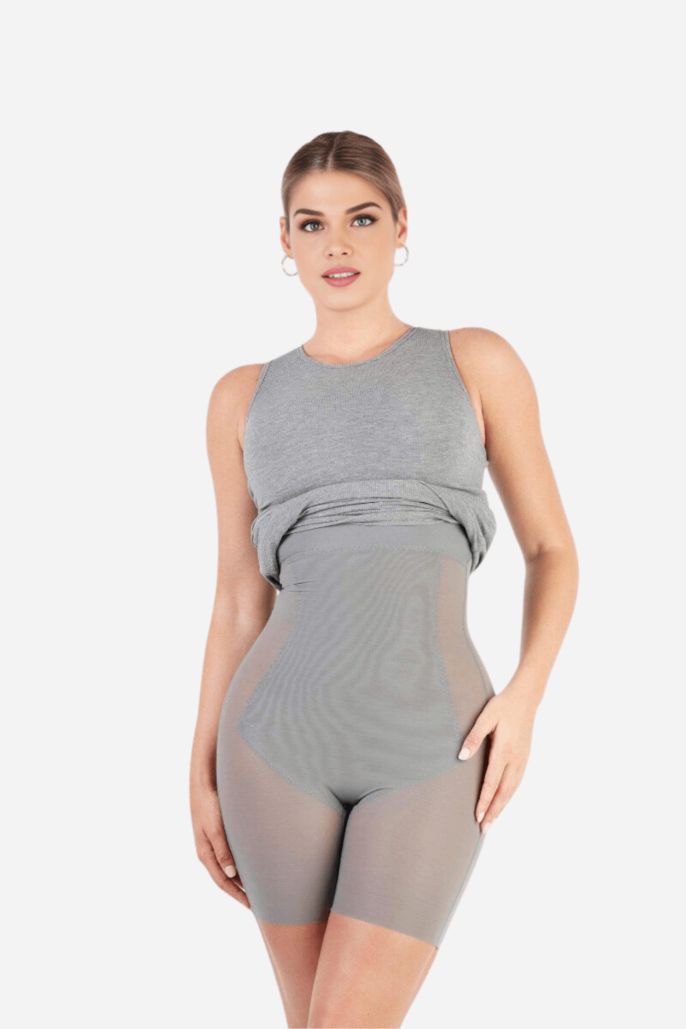 Woman showcasing Tothecurve shapewear in gray, designed for body shaping and comfort.